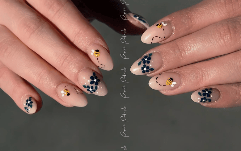 Floral and bee nail art design
